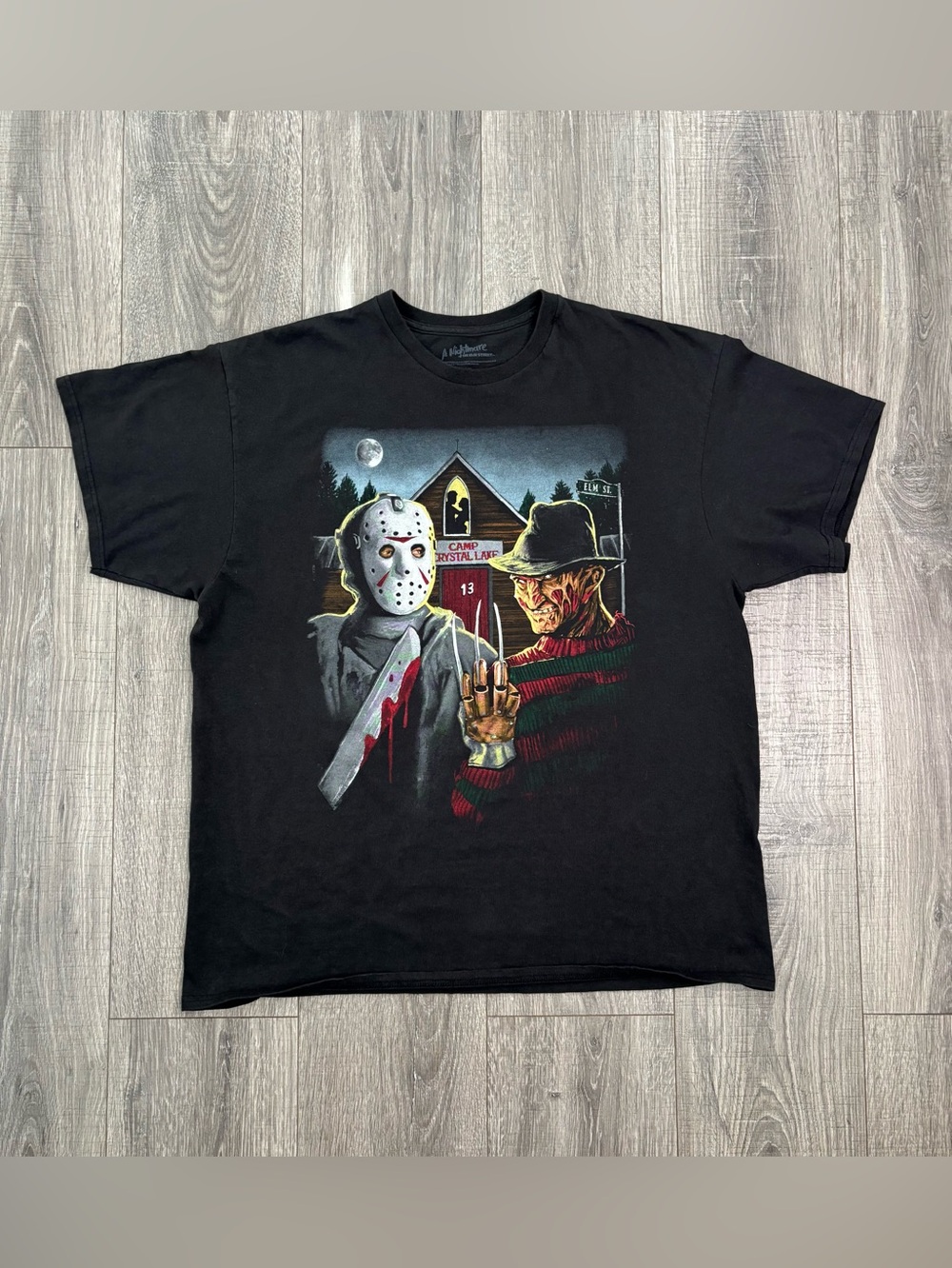 Black Short-Sleeve Graphic Tee Featuring Iconic Horror Duo